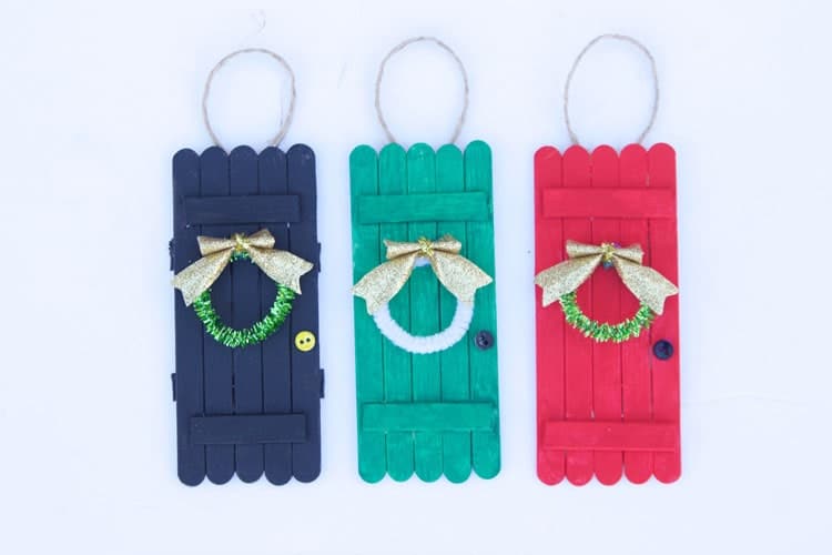 Make cute little popsicle stick doors for the holidays Caroling At Your Door