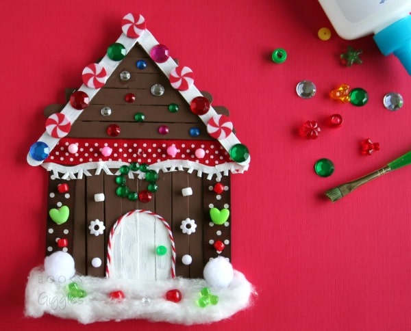 Make a gingerbread house using popsicle sticks Popsicle Stick Gingerbread House