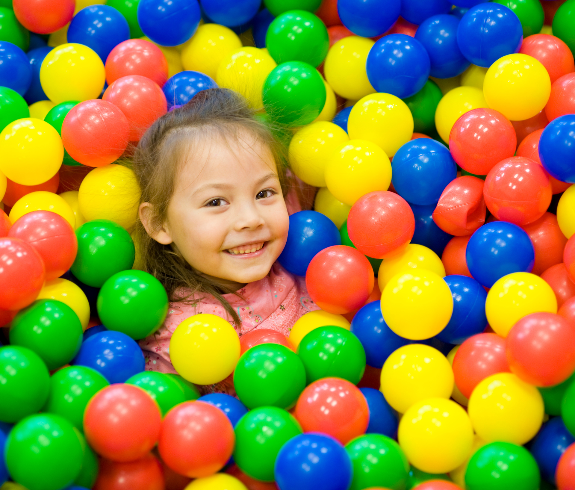 Jump And Play In A Rainbow Ball Pit