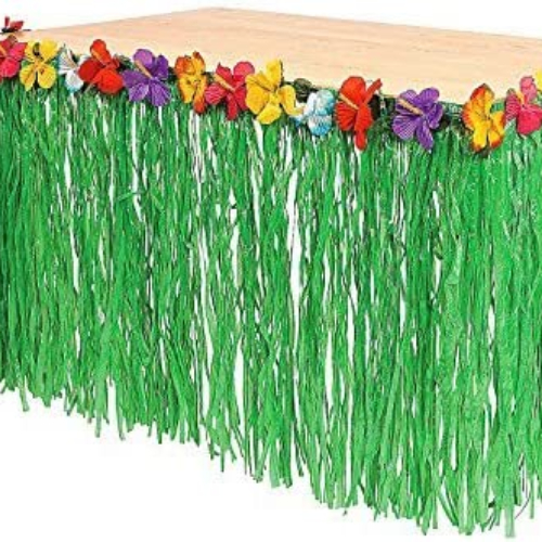 Tropical Themed Table Skirt, Balloons, And Palm Leaves